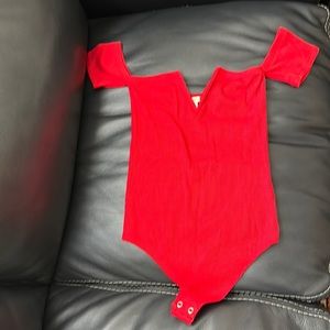 Ladies Express off shoulder body suit. Size small